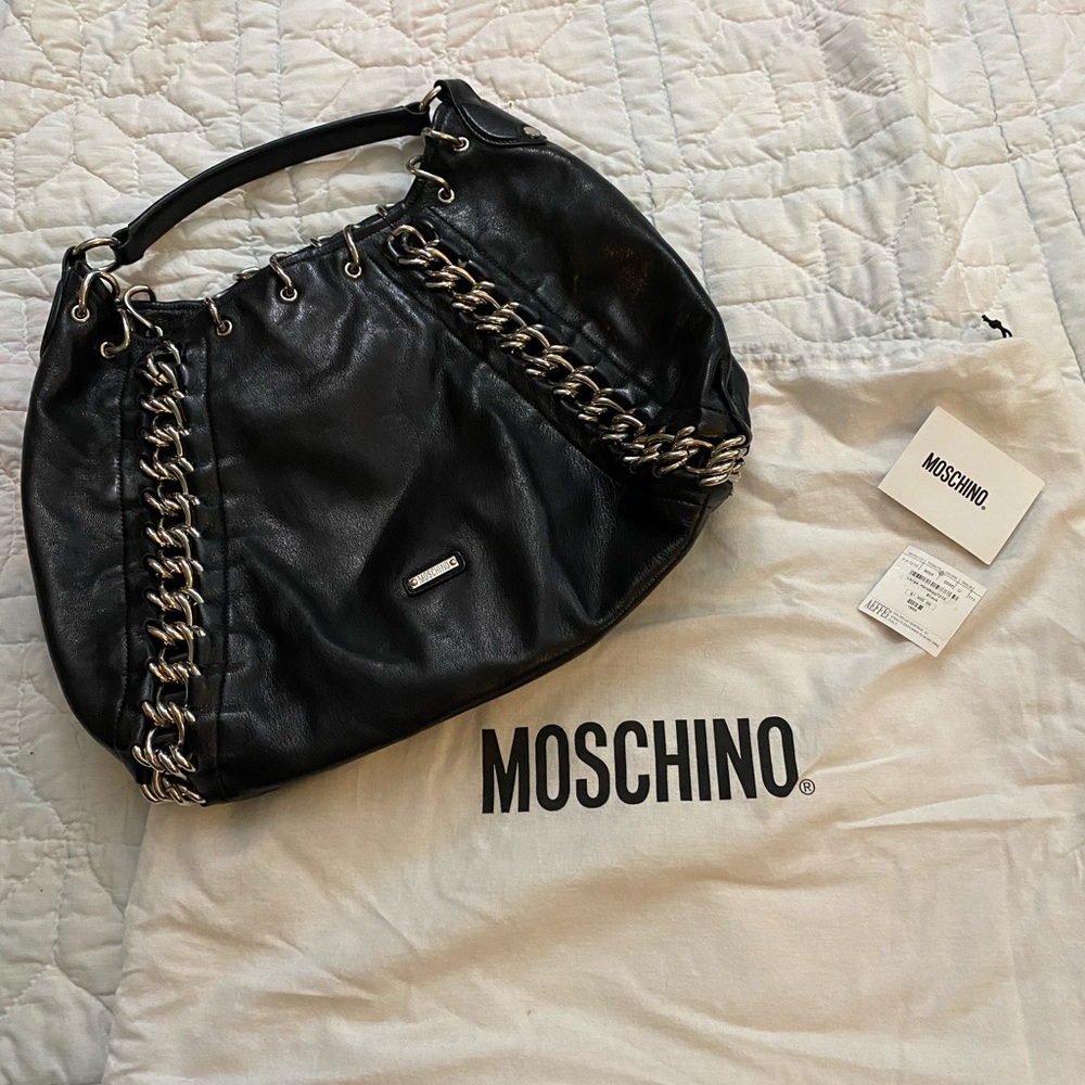 Authentic Moschino Large black bag w/silver chain accent, excellent condition.